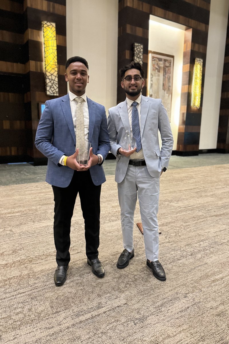 Forge Marketing team members celebrating an award together